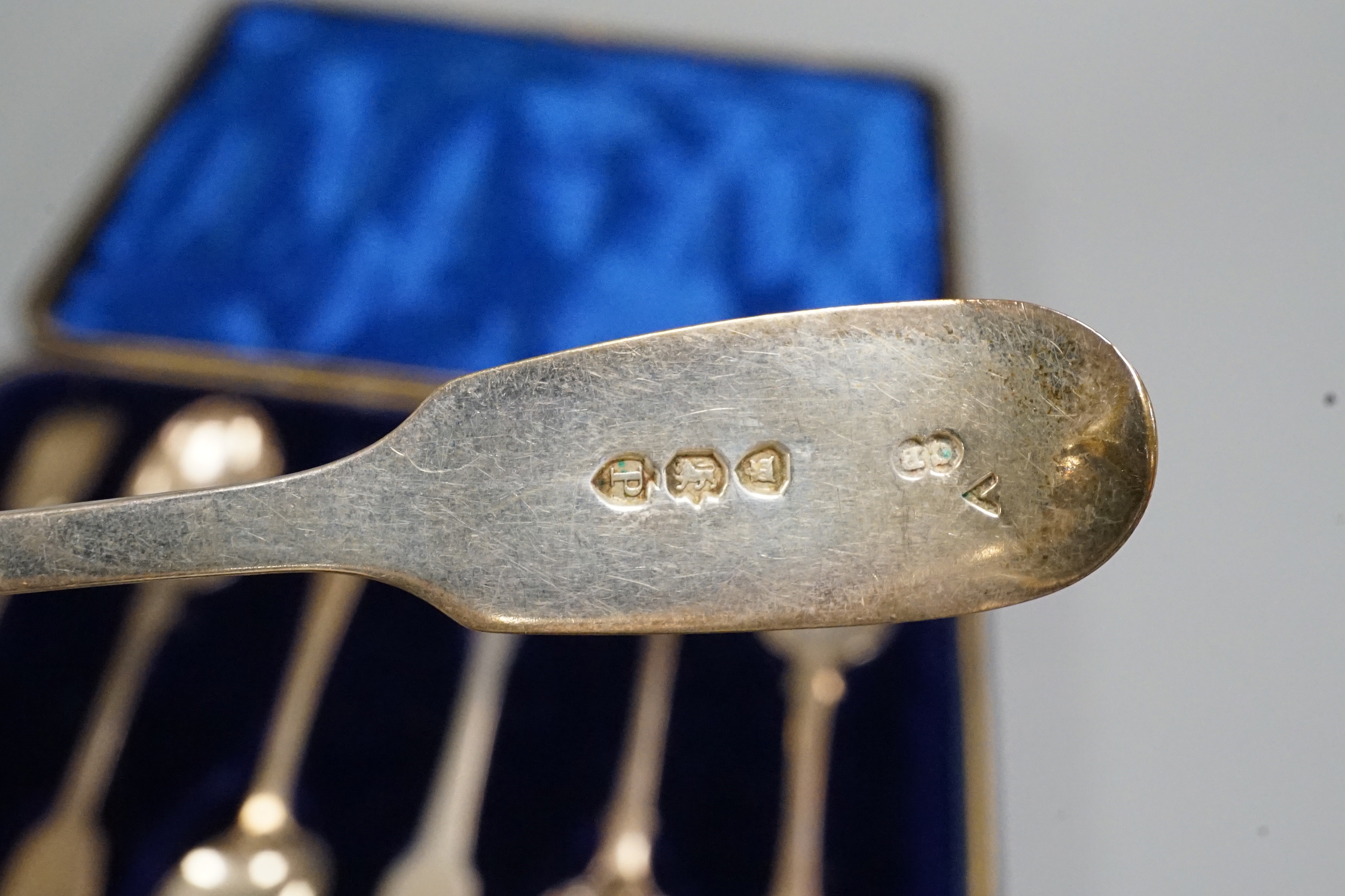 Seven silver teaspoons including five fiddle pattern, London, 1890.